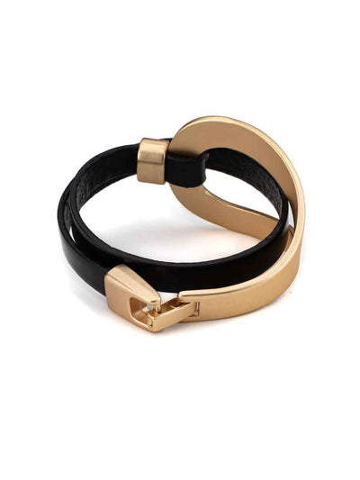 Elegant gold plated leather bracelet .