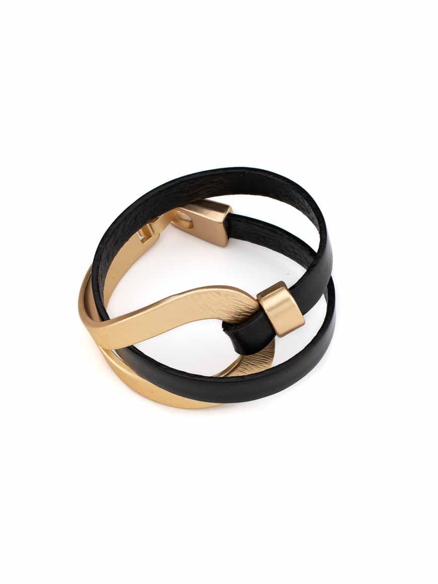 Elegant gold plated leather bracelet .