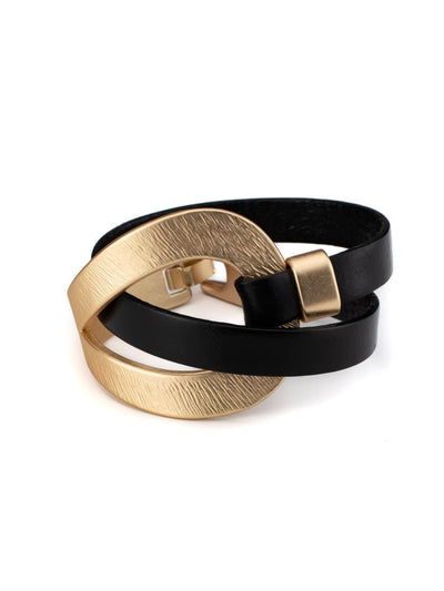 Elegant gold plated leather bracelet .