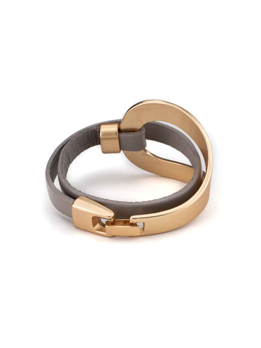 Elegant gold plated leather bracelet .