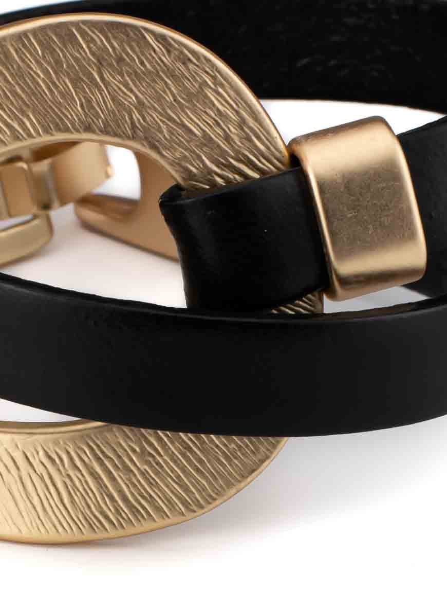 Elegant gold plated leather bracelet .