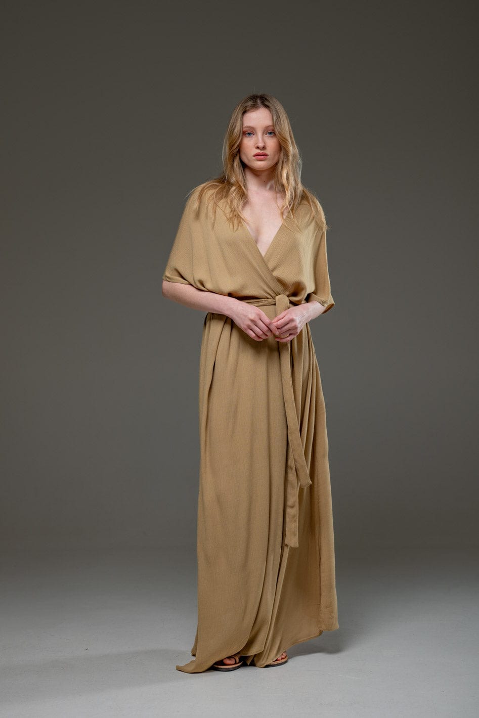 Elegant beige maxi dress with waist tie
