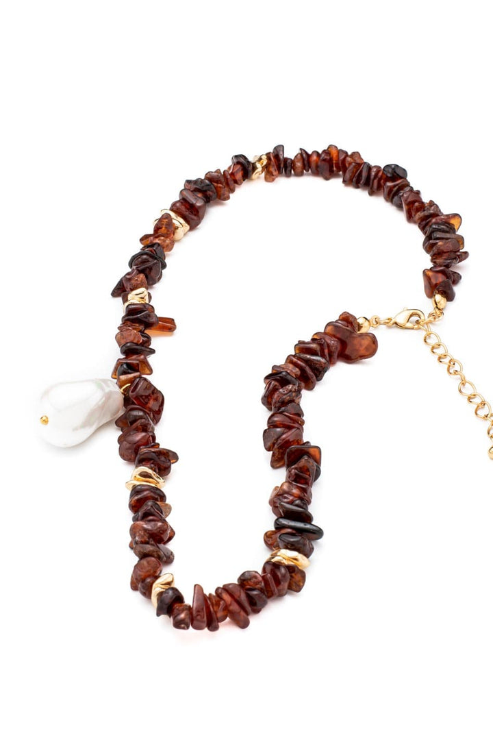 Boho necklace with brown natural stones and white pearl pendant