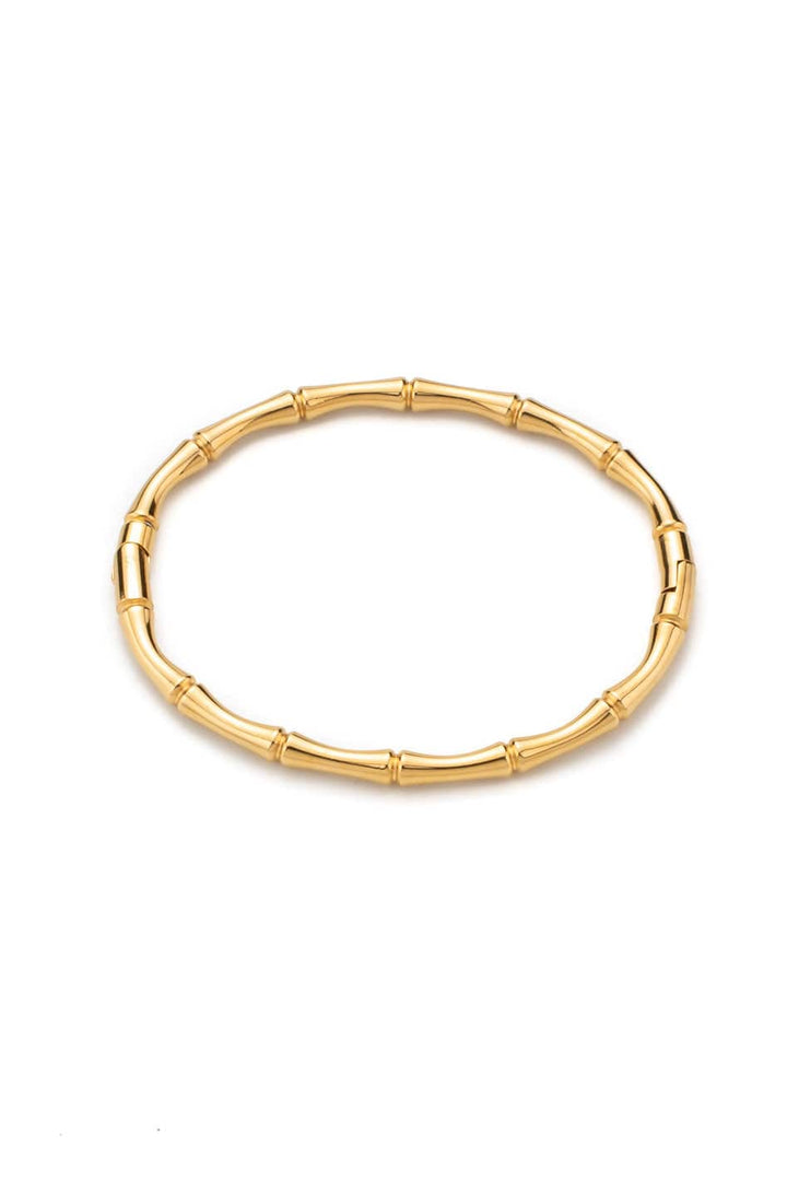 Gold bamboo style bracelet with stretch fit and minimal design