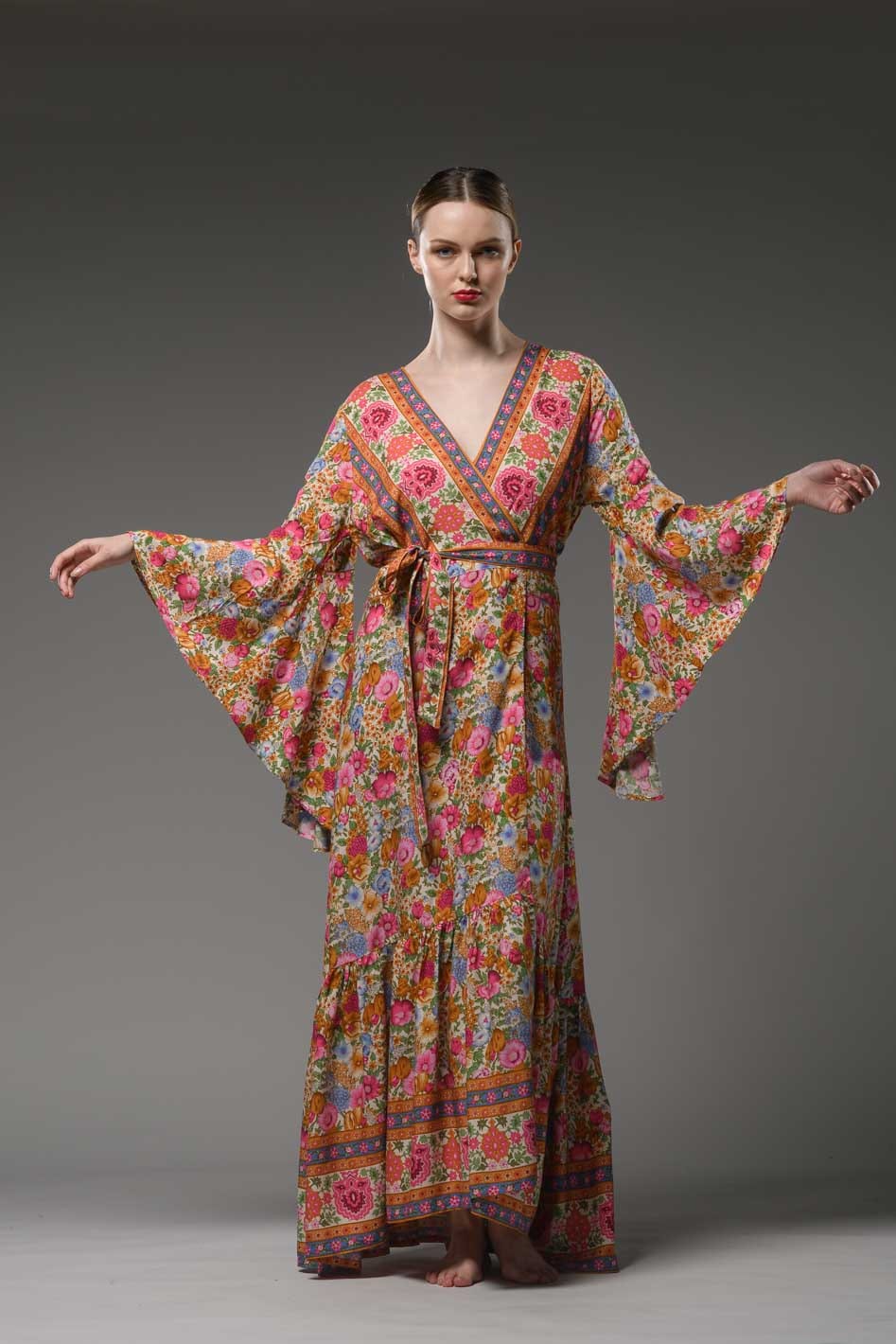 Bohemian style pink floral border printed V neck ruffled self tie waist bell sleeve maxi wrap dress
