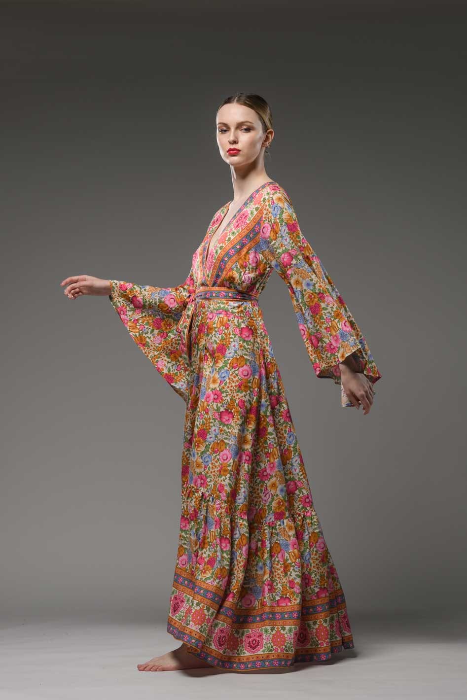 Bohemian style pink floral border printed V neck ruffled self tie waist bell sleeve maxi wrap dress