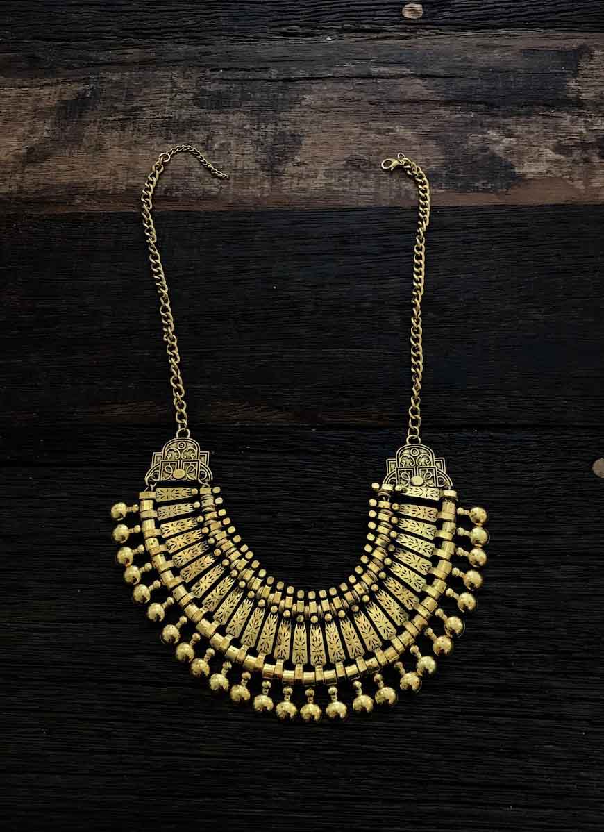  Boho gold statement necklace with ethnic design