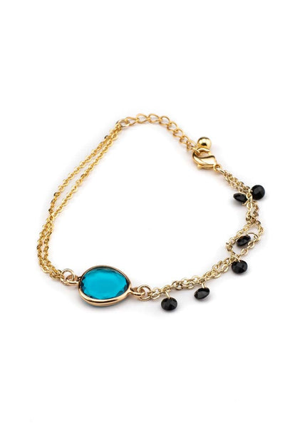 Elegant chic gold plated bracelet decorated with light blue stone and crystal beads-awatara