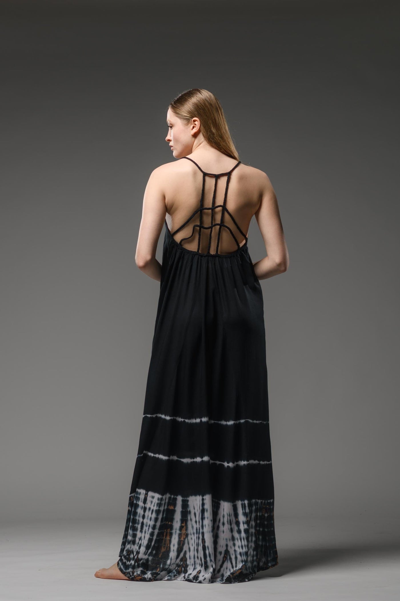  Elegant resort wear black tie dye soft rayon dress. Hand knitted braided cord ropes made of the same fabric, create a special detail net in the back.