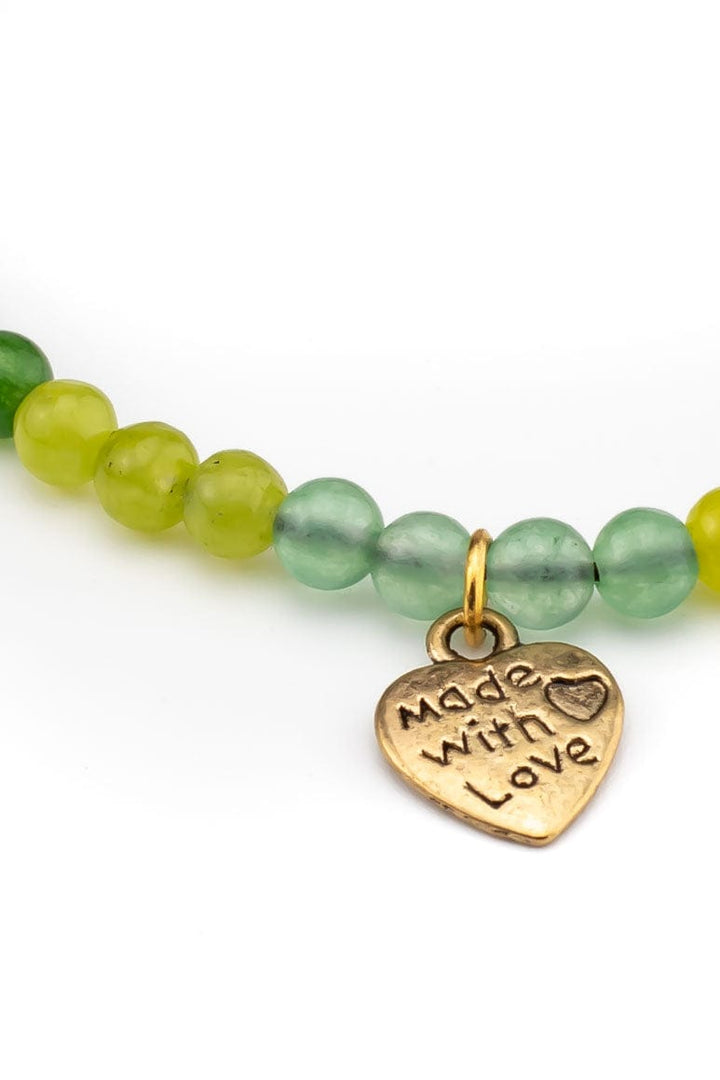 Bohemian chic handmade wax thread bracelet decorated with brass beads, green stones and heart shape pendant-awatara